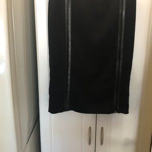 Encounter Black pencil skirt that has leather on both sides, size 6.